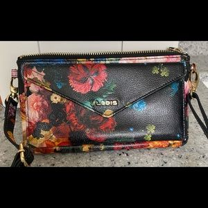 Leather hand painted wallet with a pocket.  Adjustable/removable strap.